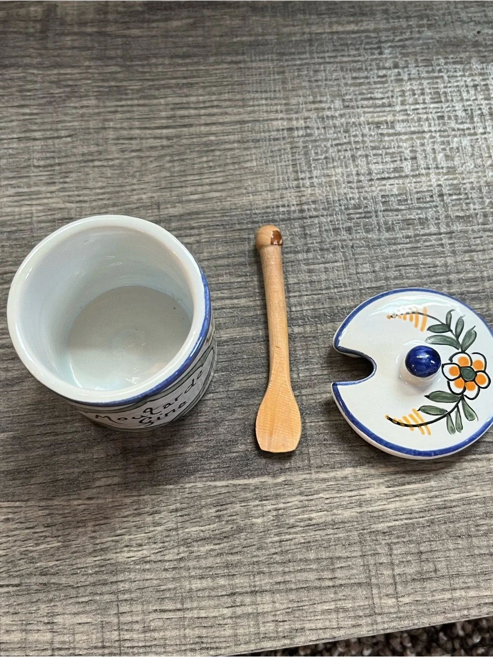 Small homemade French hand painted mustard jar with wooden spoon. Ceramic